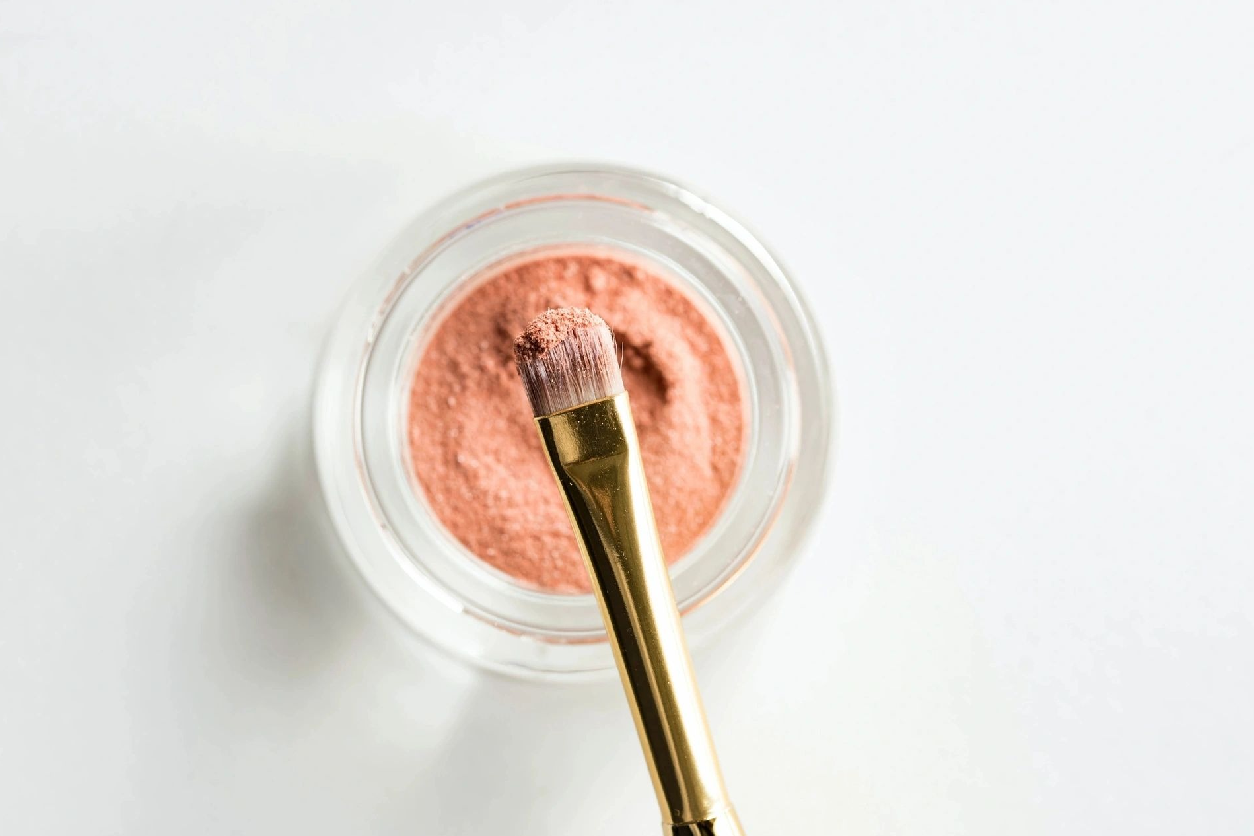 A close up of a brush in a bowl